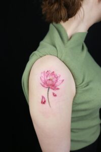 Small lotus tattoo meaning